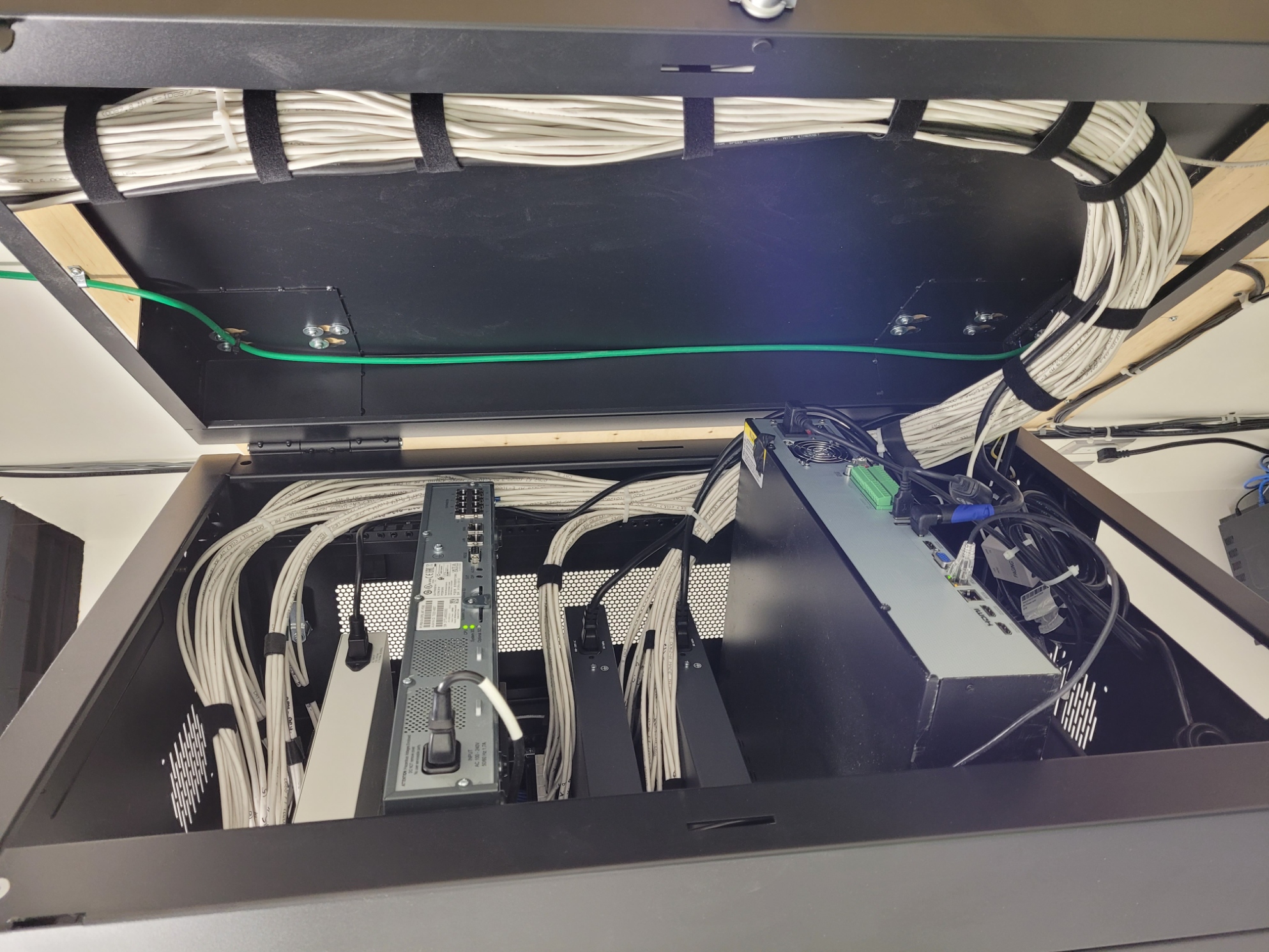 Inside view of a network cabinet with organized wiring
