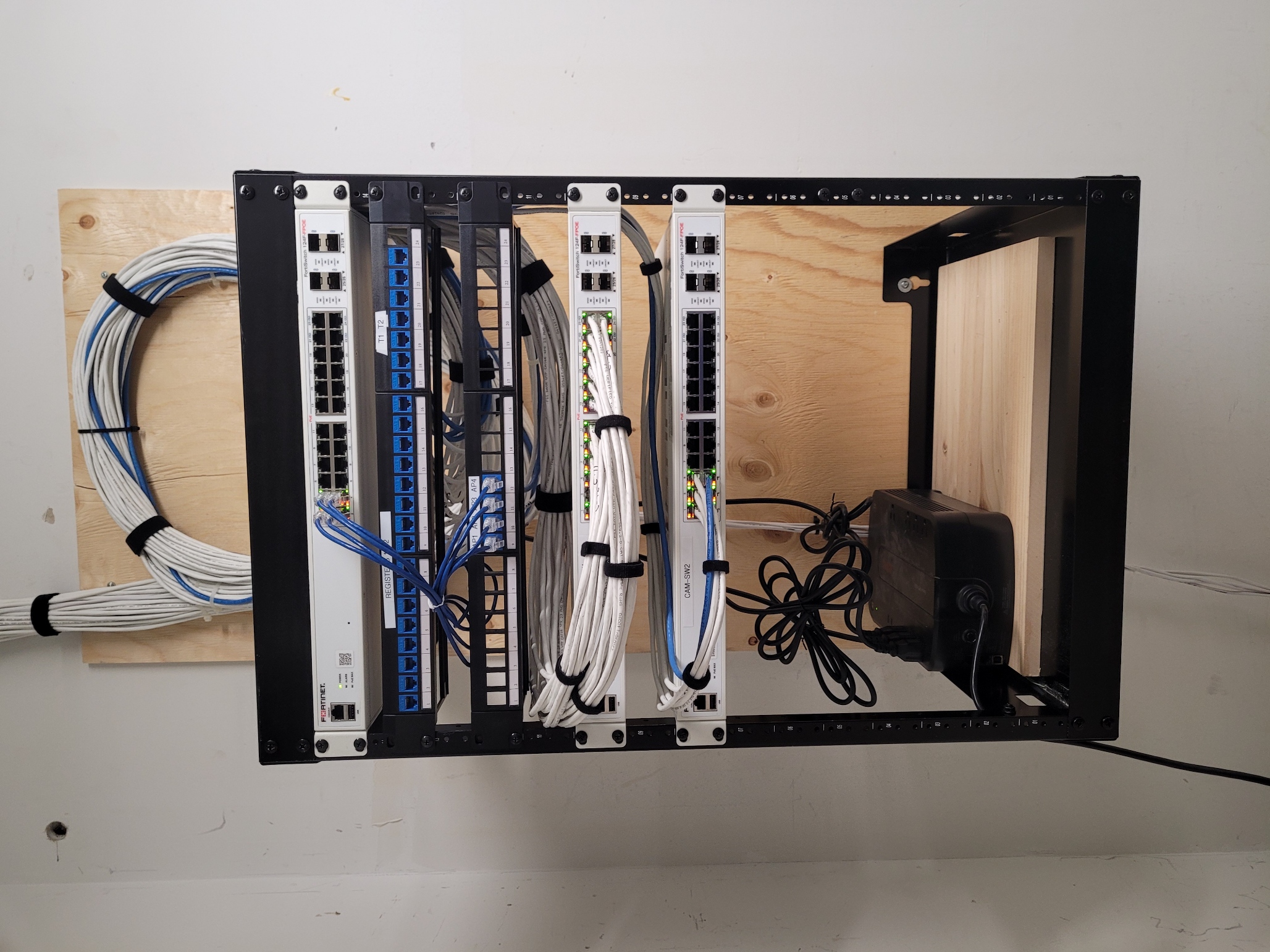Rack with network switches and patch panels